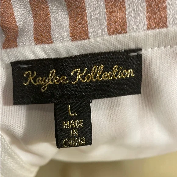 Elegant Kaylee Kollection Off-Shoulder Striped Romper - Picture 2 of 6